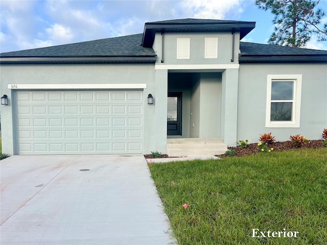 front of property with a garage and a front yard