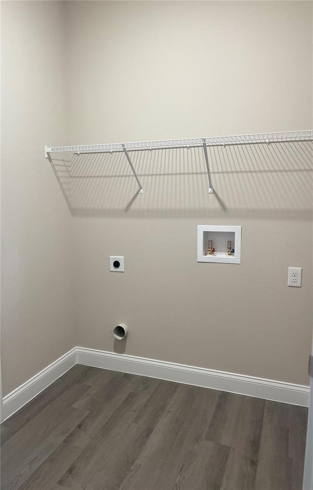 laundry room with washer hookup, dark hardwood / wood-style floors, and hookup for an electric dryer