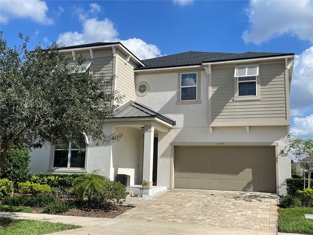 view of front of home with a garage