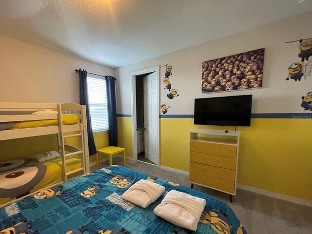 1799 Caribbean View Ter, Kissimmee, FL 34747 - bedroom featuring carpet floors and baseboards