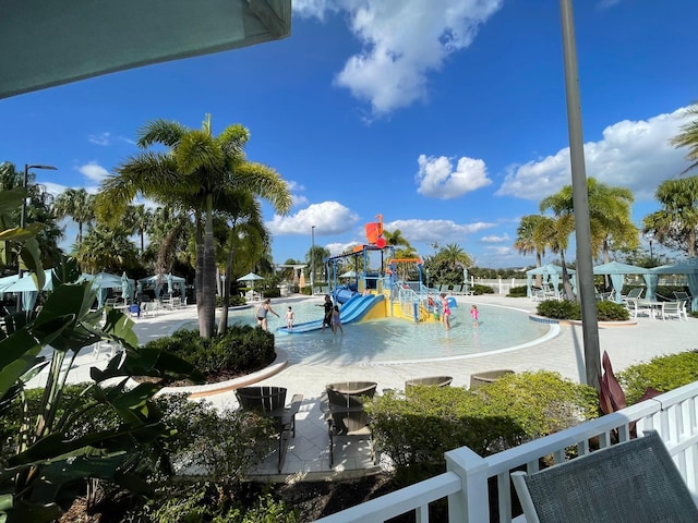 1799 Caribbean View Ter, Kissimmee, FL 34747 - community play area with a water play area and a community pool