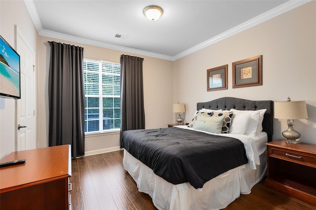 bedroom with crown molding and dark wood-type flooring