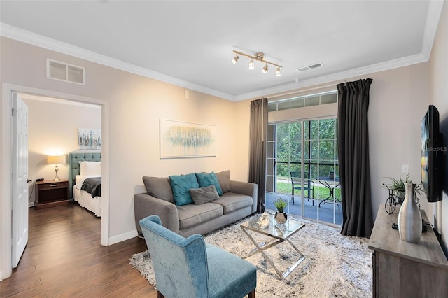 1301 Tuscan Ter Unit 9106, Davenport, FL 33896 - living room with crown molding, wood finished floors, and baseboards