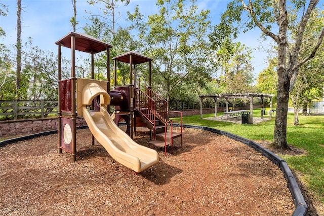 view of jungle gym featuring a lawn