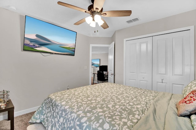 bedroom featuring ceiling fan, carpet floors, and a closet