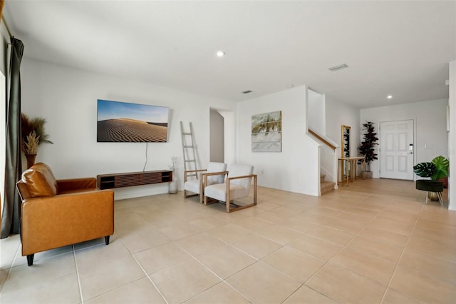 living room featuring light tile patterned flooring