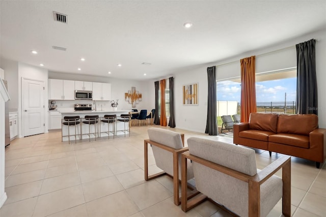 living room featuring light tile patterned floors