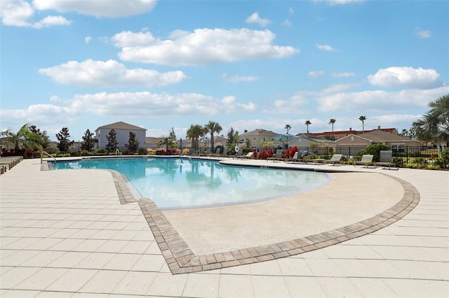 view of swimming pool featuring a patio