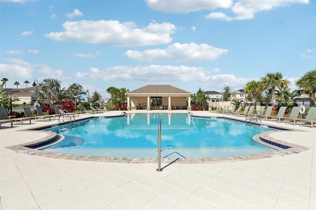 view of swimming pool featuring a patio