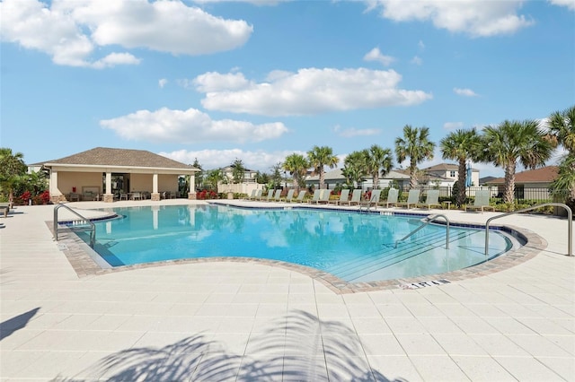 view of pool featuring a patio area