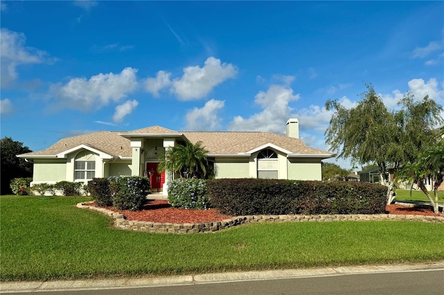 view of front facade with a front yard