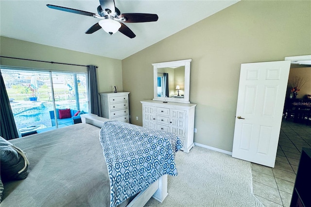 bedroom featuring light tile patterned floors, access to outside, ceiling fan, and lofted ceiling