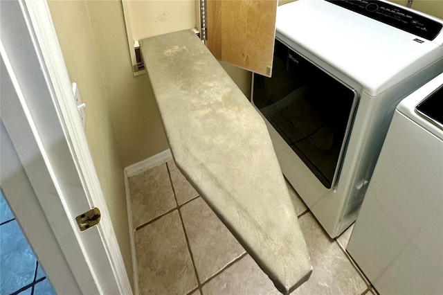 laundry room featuring light tile patterned flooring