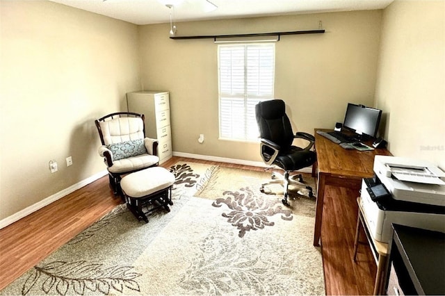 office space with ceiling fan and wood-type flooring