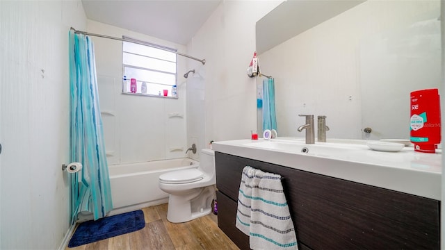 full bathroom featuring toilet, vanity, shower / bath combination with curtain, and hardwood / wood-style floors