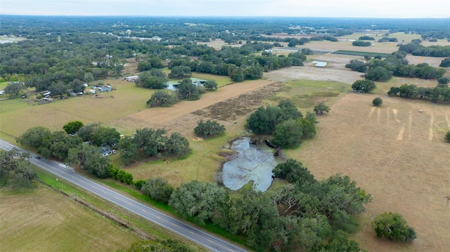 birds eye view of property featuring a rural view