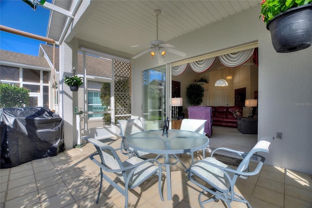 view of patio with grilling area and ceiling fan