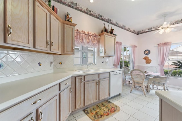 kitchen with sink, ceiling fan, tasteful backsplash, light brown cabinetry, and dishwasher