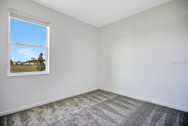 2971 Camden Way, Davenport, FL 33837 - empty room with carpet and baseboards