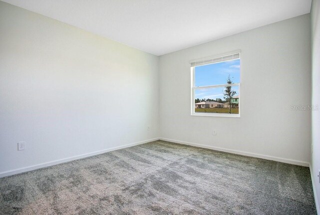 2971 Camden Way, Davenport, FL 33837 - spare room with carpet floors and baseboards