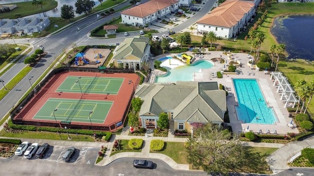 bird's eye view with a water view