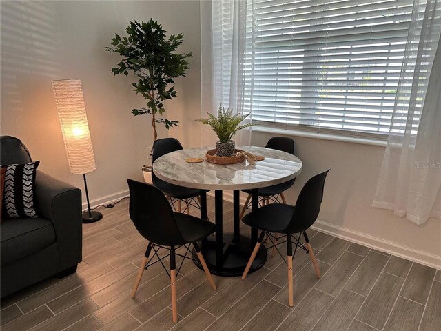 2971 Camden Way, Davenport, FL 33837 - dining room with wood tiled floors and baseboards