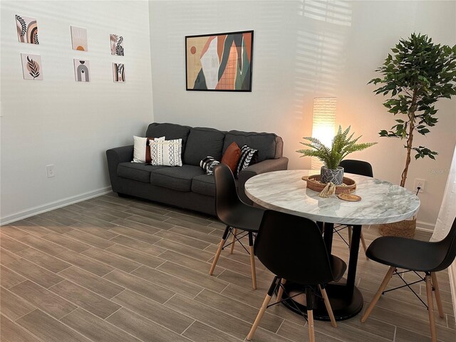 2971 Camden Way, Davenport, FL 33837 - dining space featuring baseboards and wood finished floors