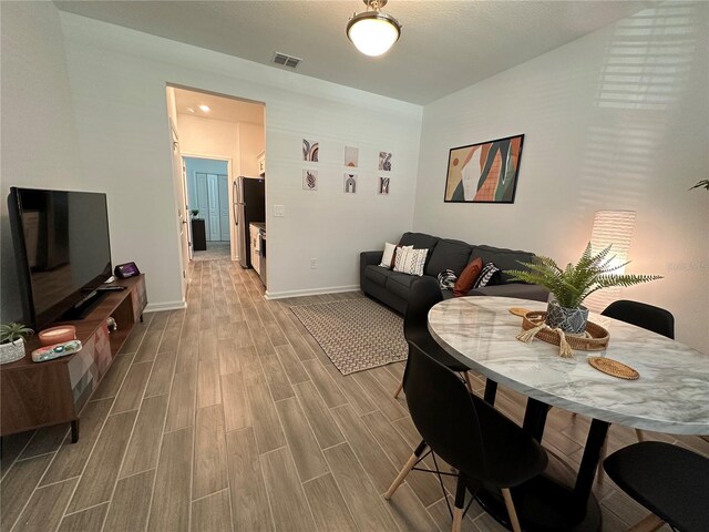 2971 Camden Way, Davenport, FL 33837 - dining space featuring wood finished floors and baseboards