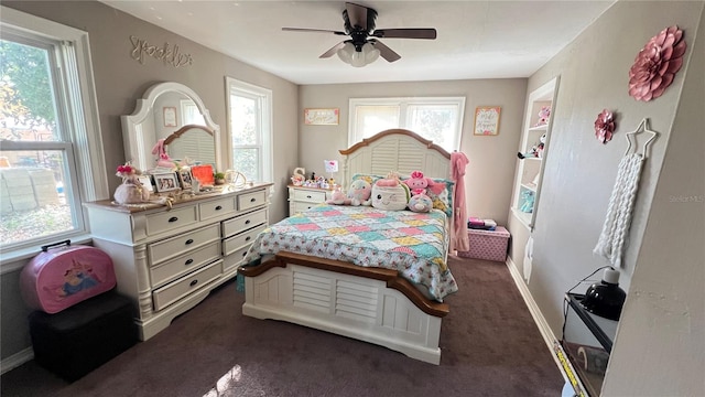 carpeted bedroom with ceiling fan