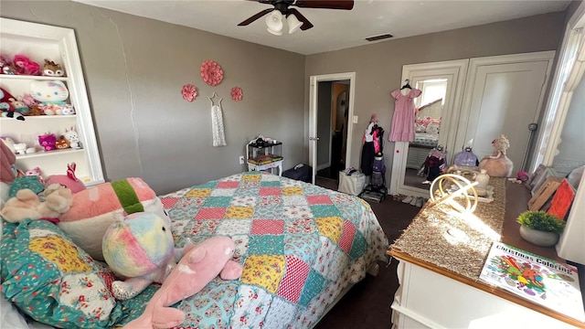 bedroom with a closet and ceiling fan