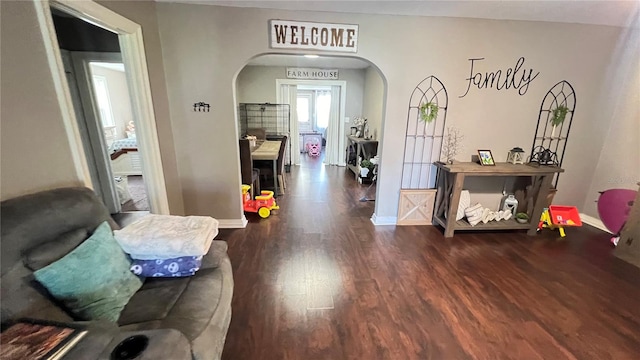 hallway with dark wood-type flooring