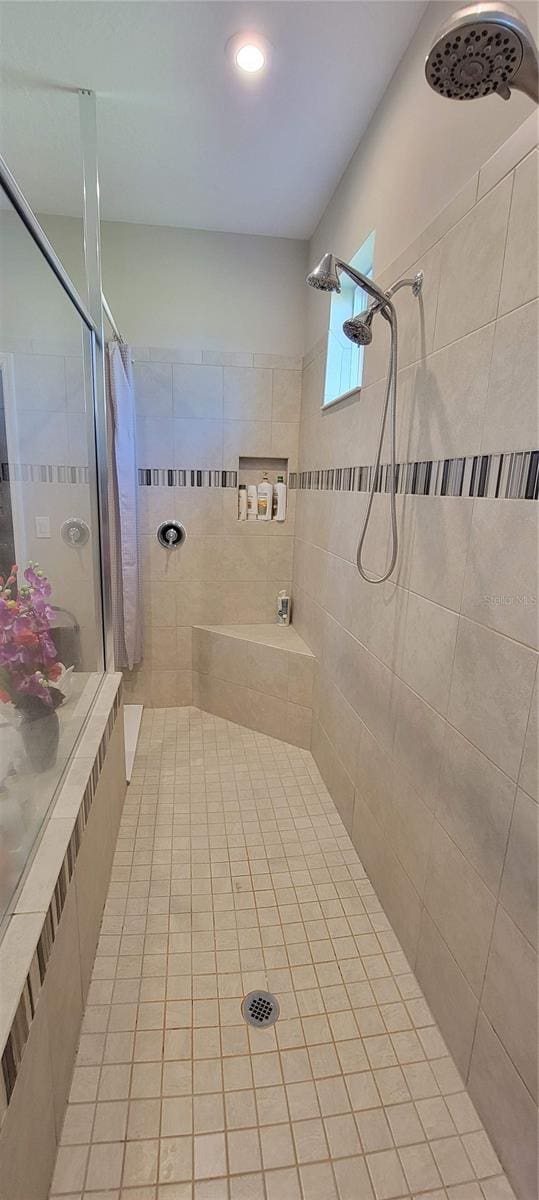 bathroom featuring curtained shower