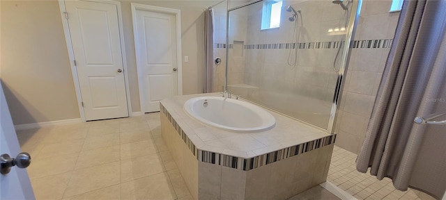 bathroom with tile patterned flooring and plus walk in shower