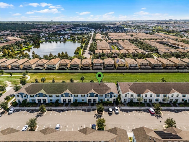 drone / aerial view with a water view