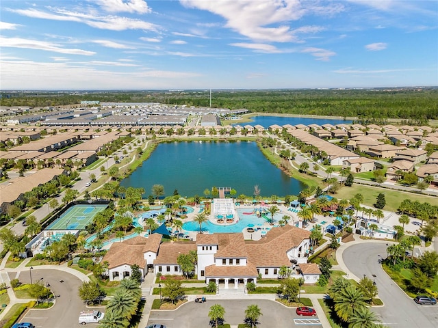 birds eye view of property featuring a water view