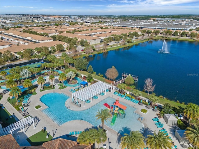 birds eye view of property featuring a water view