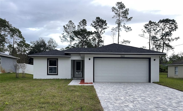 17207 Waldrun Ave, Port Charlotte, FL 33948 - ranch-style home with decorative driveway, an attached garage, stucco siding, and roof with shingles