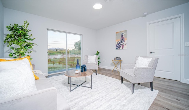 living area featuring hardwood / wood-style flooring