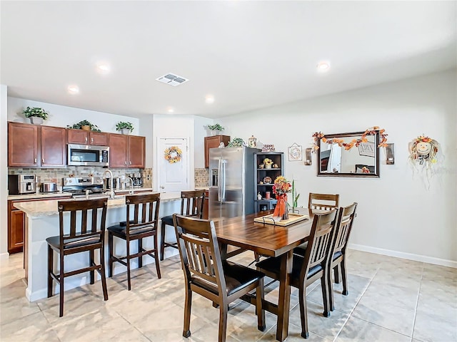 view of tiled dining space