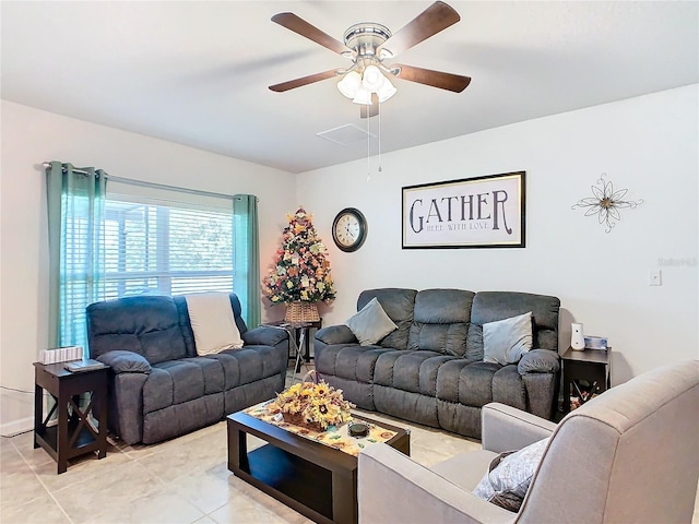 tiled living room with ceiling fan