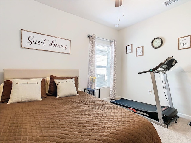 carpeted bedroom featuring ceiling fan