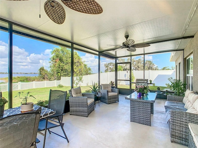 sunroom / solarium with ceiling fan