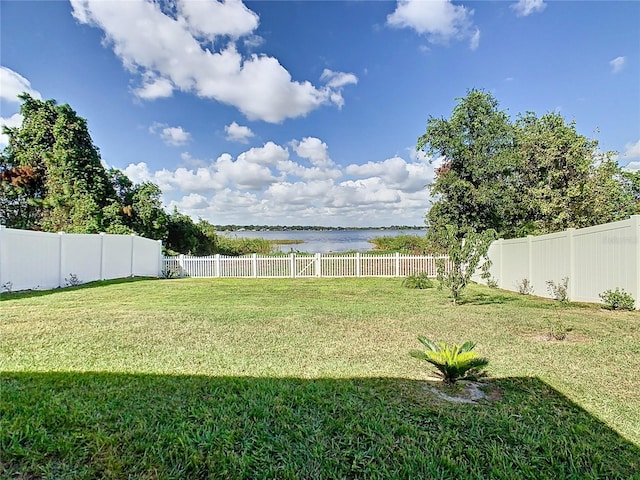 view of yard with a water view