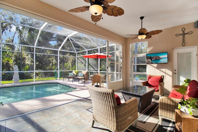 view of swimming pool with ceiling fan