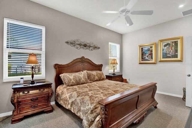 bedroom with light carpet and ceiling fan