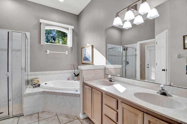 bathroom with vanity, shower with separate bathtub, and tile patterned flooring