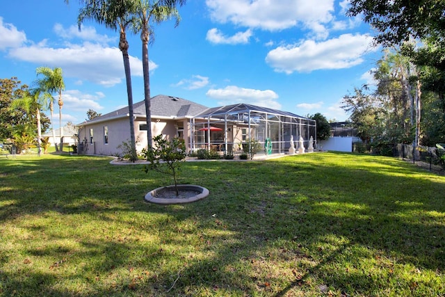 view of yard featuring a lanai