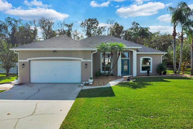 single story home with a front lawn and a garage