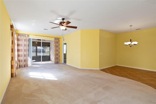 3401 Home Town Ln, Saint Cloud, FL 34769 - spare room featuring a chandelier, carpet floors, a ceiling fan, baseboards, and tile patterned floors
