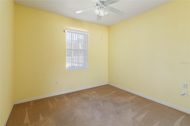 3401 Home Town Ln, Saint Cloud, FL 34769 - unfurnished room featuring carpet flooring, a ceiling fan, and baseboards